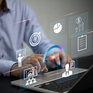 Man on laptop with visualisation data floating above